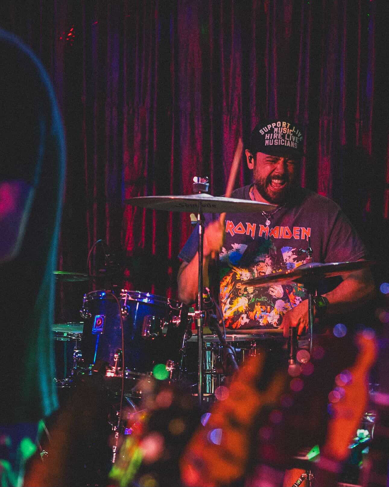 Ian Hoey playing drums live